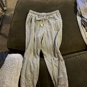 Cuffed ankles. Light grey comfy sweats